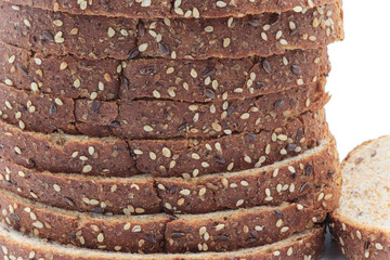 Close-up sliced ​​wholemeal bread, on white background
