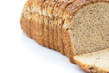 Close-up sliced ​​wholemeal bread, on white background
