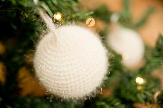 Home Made Knitted Christmas Tree Toy. From DIY Series. Religious Holidays With Family, Home Traditions. Greeting Card Concept. Spruce Decoration.