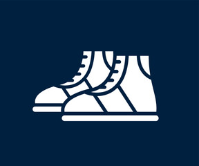 Classic sneakers or boots for sport or hiking icon