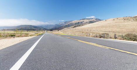 Asphalt road and countryside landscape
