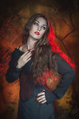 Beautiful sexy woman witch with long hair