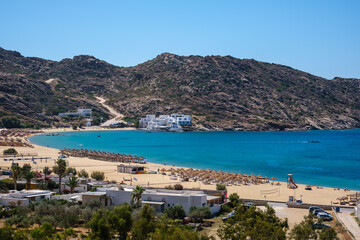 Fototapeta na wymiar Breathtaking panoramic view of the famous Mylopotas beach in Ios Greece