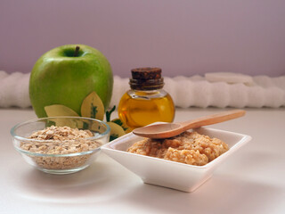 Homemade face mask of oatmeal, apple and olive oil
