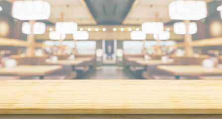 Empty wood table top with blurred Japanese restaurant background