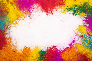Power multi color splash on white background for holi celebration with text space
