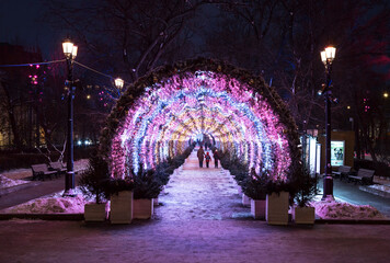 A light tunnel on Tverskoy Boulevard in the early morning on New Year's holidays. Moscow, Russia