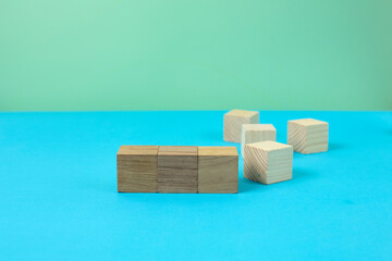 group of wooden cubes on a colored background for your advertising inscriptions