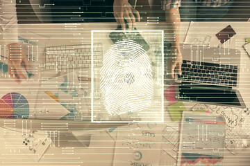 Double exposure of man and woman working together and fingerprint hologram drawing. Security concept. Computer background.