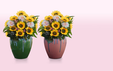 two flowers in pots, yellow sunflowers and pink flowers bouquet in a green and blue ceramic pot and yellow sunflowers and pink flowers bouquet in a pink and blue ceramic pot on pink background
