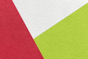 Texture of craft white, red and green color paper background, macro. Vintage wine abstract...