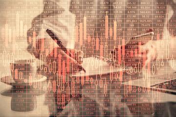 Double exposure of financial graph sketch hologram and woman holding and using a mobile device. Stock exchange concept.