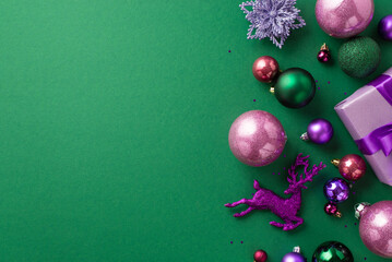 Christmas decorations concept. Top view photo of lilac giftbox pink violet green baubles reindeer...