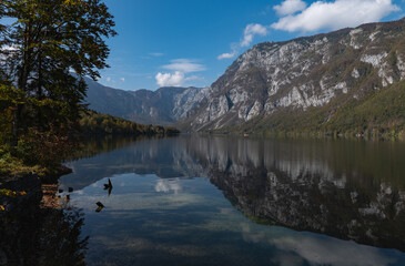 Lake Bohinj and Julian Alps in autumn, Slovenia, reflections in the water