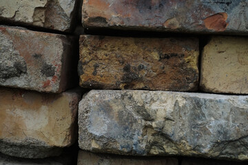 texture of an old brick left on the street