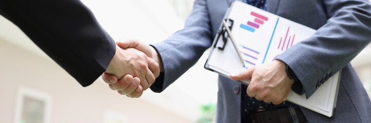 Partners shake hands, beneficial deal, successful agreement, biz partners perform friendly gesture
