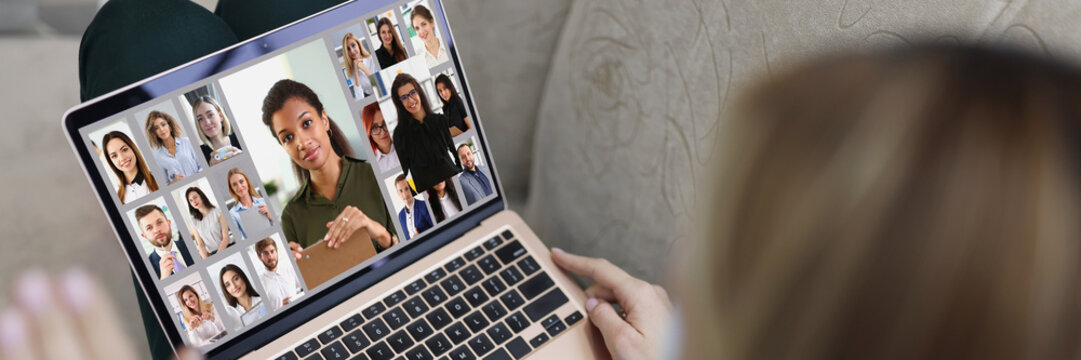 Young Woman Wave Hi To Coworkers Connected Online Via Video Call, Remote Conference