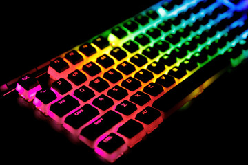 RGB gaming mechanical keyboard with colorful led keys.