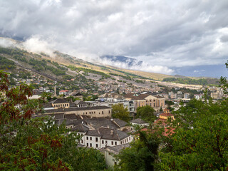 Fototapeta na wymiar Panoramic view of the town of Gjirokaster on a cloudy day
