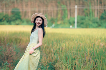 girl walking on rice fields