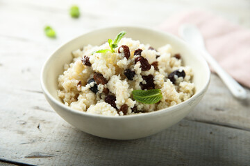 Healthy millet porridge with raisins