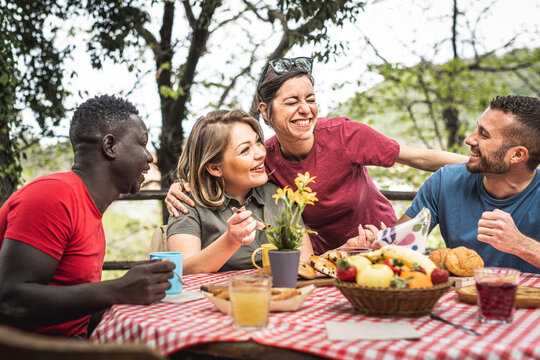 Vegan People Having Breakfast In The Garden, Healthyfood And Lifestyle, Happy Freinds Spending Funny Times Together