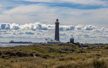 Fototapeta na wymiar Skagen Lighthouse - Skagens Odde, English Scaw Spit or The Skaw is a sandy peninsula the northernmost area of Vendsyssel in Jutland, Denmark.,Europe