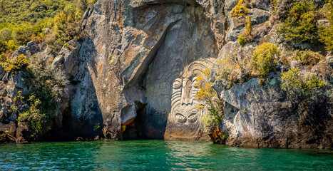 traditional rock carving lake taupo north island new zealand. High quality photo - obrazy, fototapety, plakaty