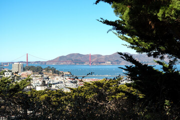 Fototapeta na wymiar Panoramic scenic aerial view over San Francisco Bay Area with Golden Gate Bridge, downtown skyline cityscape and Alcatraz island sailing boats yachts harbor landmark sights Tower scenery