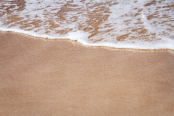 Sand beach and waves