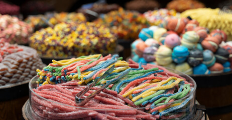 candies with jelly and sugar. colorful array of different childs sweets and treats