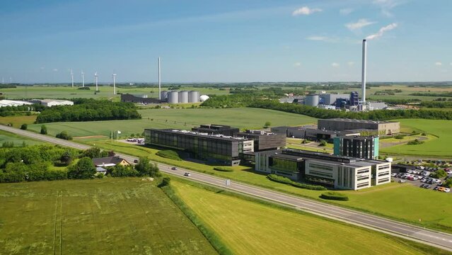 Footage of industrial park and bioenergy plant. Concept of sustainable production of biogas. Concept of biomass heat and power. Renewable and low carbon energies production.