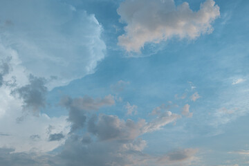 Sky with clouds in light blue colors