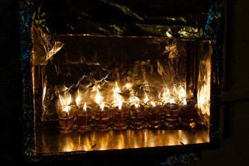 A Hanukkah menorah in Jerusalem, Israel, where it is traditional to burn oil in small glass vials instead of wax candles to mark the celebration of the Festival of Lights.