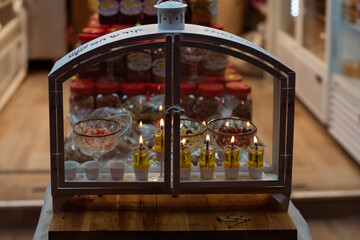 Hanukkah candles burning outside a home in Jerusalem, where it is traditional to burn oil instead of wax in small vials during the celebration of the Festival of Lights in Israel.