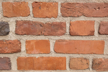 Concrete wall with red bricks, background, wall texture.