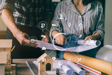 Confident team of architect working together in a office.Then discussing about new startup project on desk.in office, architectural concept.