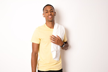 Portrait of a athletic man after doing exercises, isolated over a white background