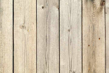 Bright wooden planks texture background with nail holes and knots