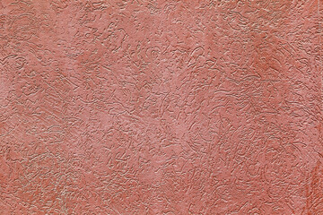 Fototapeta premium Fine detail light red textured plaster wall surface