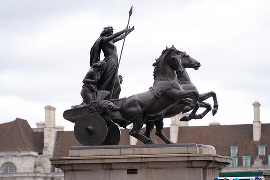 Bronze memorial of Boudica with her daughters at City of Westminster on a cloudy summer day. Photo taken August 3rd, 2022, London, United Kingdom.