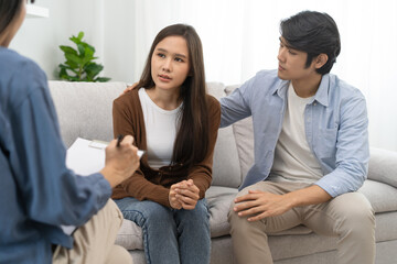 couple relationship therapy with a counselor. Close Up hands of the woman client during a...