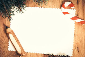 blank sheet of paper on the wooden floor with a pencil