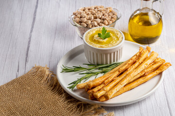 Homemade Grissini with Chickpea Hummus.