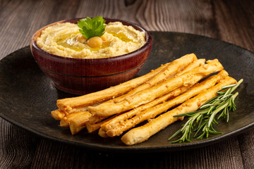 Homemade Grissini with Chickpea Hummus.