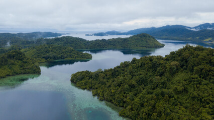 Fototapeta na wymiar Seascape in front of Kaprus Village, Location in Cendrawasih Bay National Park, West Papua Province