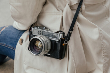 Crop tourist with retro camera