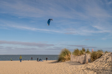 Texel, Netherlands. October 2022. Kitesurfers on the beach of Texel.