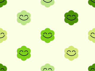 Smile cartoon character seamless pattern on green background