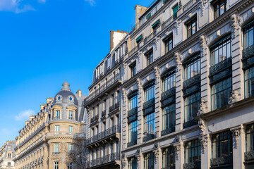Paris, beautiful building, ancient facade rue du Louvre
